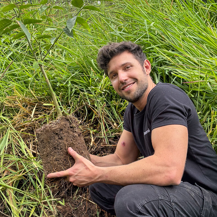 Alejandro Arteaga planting a Cedrela odorata during the 1st reforestation campaign at the Arlequin Reserve